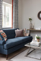 Lounge interior by Sims Hilditch featuring Carnac Printed Drapery in Dark Indigo, with indigo accents creating a calm, balanced atmosphere.
